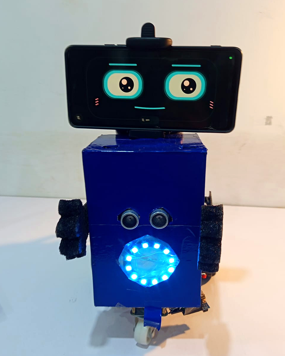 Front view of AMSAN with its animated smartphone face and illuminated RGB ring.
